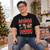 Model wearing the Black Best Christmas Hans Down T-Shirt at home