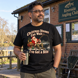 Christmas Dinner Can Wait — I've Got a Bite fishing Christmas T-shirt — lifestyle model view