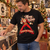 Elvis-inspired Sleigh Me Tender Christmas T-shirt – model in record shop