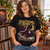 Fleetwood Snow Christmas T-shirt worn by a woman in a cosy home with vinyl records