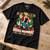 Hoah Momma Christmas T-shirt on an oak studio workbench