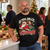 Is This Jolly Enough Christmas T-shirt worn by a man at a festive gathering