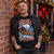 Ozzy Snowbourne Crazy Sleigh Christmas T-shirt worn outside a festive live music venue