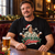 Let It Snow Christmas T-shirt worn by an adult man in a festive pub