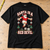 Manchester Utd-inspired Santa Is a Red Devil Christmas T-shirt flat on oak workbench