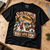 Sled Zeppelin Christmas T-shirt laid flat on an oak studio workbench