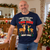 Model wearing the Navy Two Deer Christmas T-Shirt